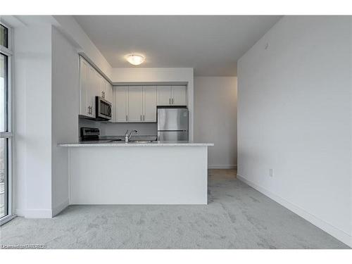 905-450 Dundas Street E, Waterdown, ON - Indoor Photo Showing Kitchen