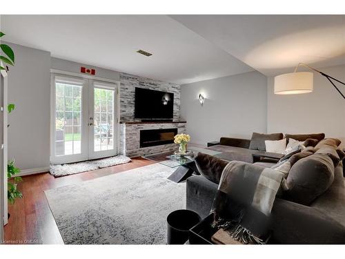 1494 Litchfield Drive, Oakville, ON - Indoor Photo Showing Living Room With Fireplace