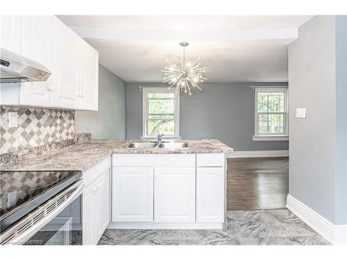 140 Gage Avenue N, Hamilton, ON - Indoor Photo Showing Kitchen With Double Sink