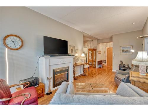 316-2085 Amherst Heights Drive, Burlington, ON - Indoor Photo Showing Living Room With Fireplace