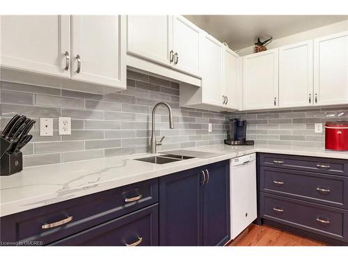 316-2085 Amherst Heights Drive, Burlington, ON - Indoor Photo Showing Kitchen With Double Sink