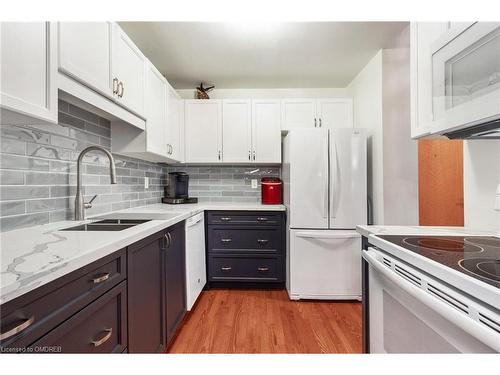 316-2085 Amherst Heights Drive, Burlington, ON - Indoor Photo Showing Kitchen With Double Sink