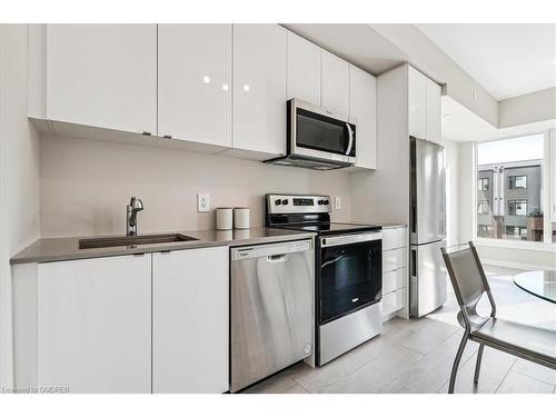 202-1440 Clarriage Court, Milton, ON - Indoor Photo Showing Kitchen With Upgraded Kitchen