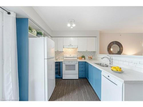 201-1491 Maple Avenue, Milton, ON - Indoor Photo Showing Kitchen With Double Sink