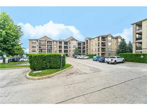 201-1491 Maple Avenue, Milton, ON - Outdoor With Balcony With Facade