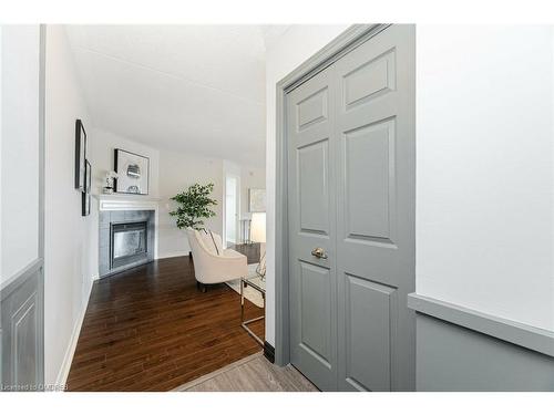 201-1491 Maple Avenue, Milton, ON - Indoor Photo Showing Other Room With Fireplace