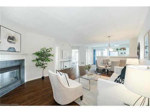 201-1491 Maple Avenue, Milton, ON - Indoor Photo Showing Living Room With Fireplace