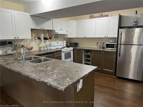 614 West 5Th Street, Hamilton, ON - Indoor Photo Showing Kitchen With Double Sink