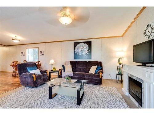 23 Olympia Avenue Pvt Avenue, Puslinch, ON - Indoor Photo Showing Living Room With Fireplace