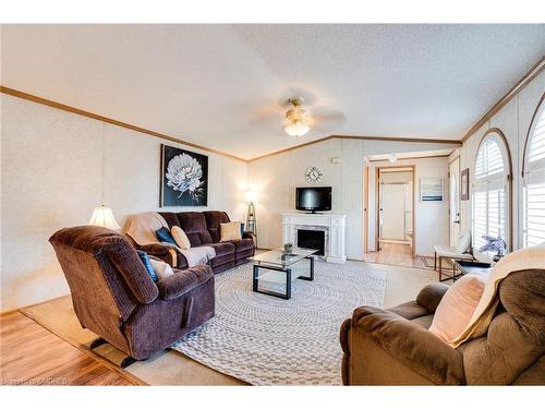 23 Olympia Avenue Pvt Avenue, Puslinch, ON - Indoor Photo Showing Living Room With Fireplace