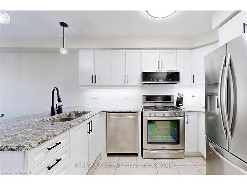 13-1725 Pure Springs Boulevard Boulevard, Pickering, ON - Indoor Photo Showing Kitchen With Stainless Steel Kitchen With Double Sink With Upgraded Kitchen