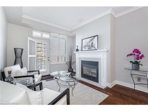 25 Kingsbridge Gardens Circle, Mississauga, ON - Indoor Photo Showing Living Room With Fireplace