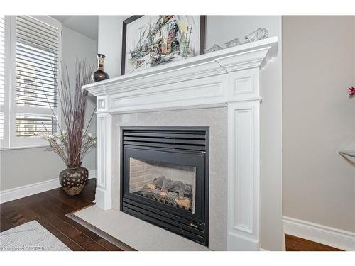 25 Kingsbridge Gardens Circle, Mississauga, ON - Indoor Photo Showing Living Room With Fireplace