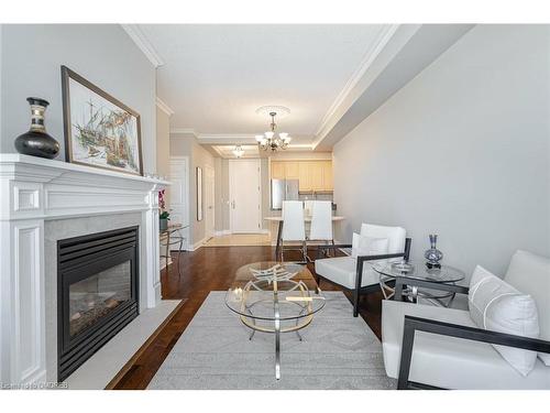 25 Kingsbridge Gardens Circle, Mississauga, ON - Indoor Photo Showing Living Room With Fireplace