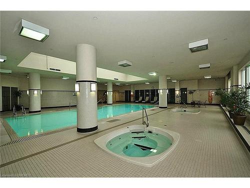 25 Kingsbridge Gardens Circle, Mississauga, ON - Indoor Photo Showing Other Room With In Ground Pool