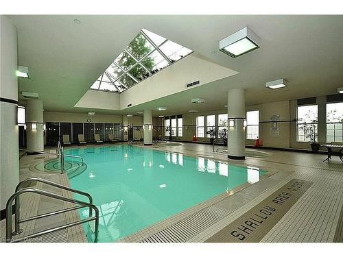 25 Kingsbridge Gardens Circle, Mississauga, ON - Indoor Photo Showing Other Room With In Ground Pool