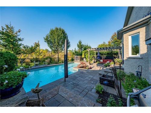 10 Orchid Avenue, Georgetown, ON - Outdoor With In Ground Pool With Backyard