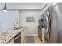 212-2375 Bronte Road, Oakville, ON  - Indoor Photo Showing Kitchen With Stainless Steel Kitchen With Double Sink With Upgraded Kitchen 