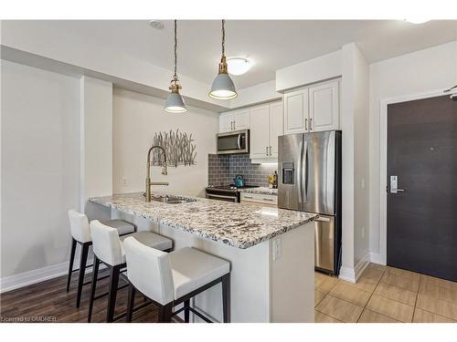 212-2375 Bronte Road, Oakville, ON - Indoor Photo Showing Kitchen With Stainless Steel Kitchen With Upgraded Kitchen