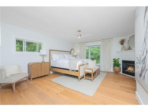 27 Tweedle Street, Glen Williams, ON - Indoor Photo Showing Bedroom With Fireplace