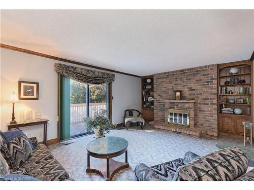 5344 Durie Road, Peel, ON - Indoor Photo Showing Living Room With Fireplace