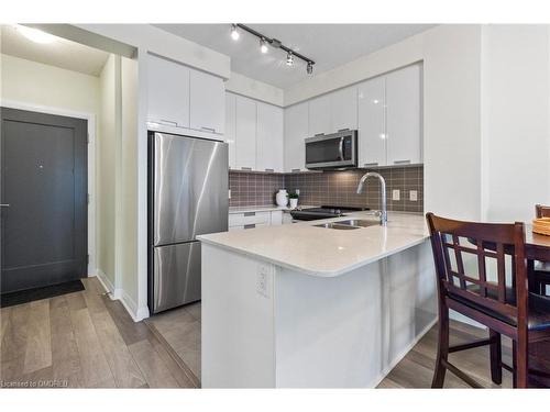 1811-5033 Four Springs Avenue, Mississauga, ON - Indoor Photo Showing Kitchen With Stainless Steel Kitchen With Double Sink