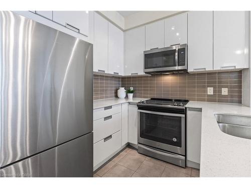 1811-5033 Four Springs Avenue, Mississauga, ON - Indoor Photo Showing Kitchen With Stainless Steel Kitchen With Double Sink With Upgraded Kitchen