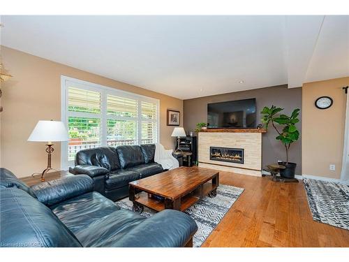 10 Baylor Crescent, Georgetown, ON - Indoor Photo Showing Living Room With Fireplace