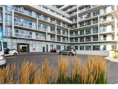 705-65 Speers Road, Oakville, ON - Outdoor With Balcony With Facade