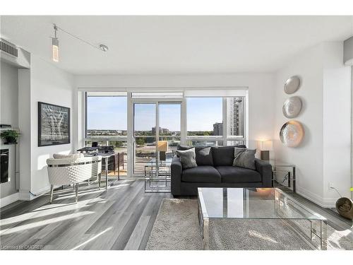 705-65 Speers Road, Oakville, ON - Indoor Photo Showing Living Room