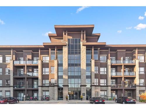 302-5020 Corporate Drive, Burlington, ON - Outdoor With Balcony With Facade