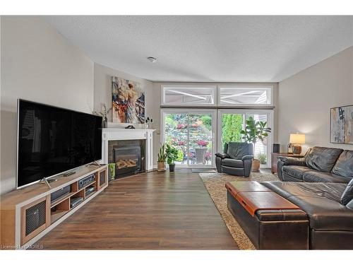 8-177 Main Street W, Grimsby, ON - Indoor Photo Showing Living Room With Fireplace