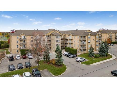 409-1470 Bishops Gate, Oakville, ON - Outdoor With Balcony With Facade