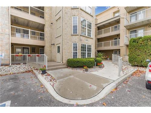 409-1470 Bishops Gate, Oakville, ON - Outdoor With Balcony With Facade