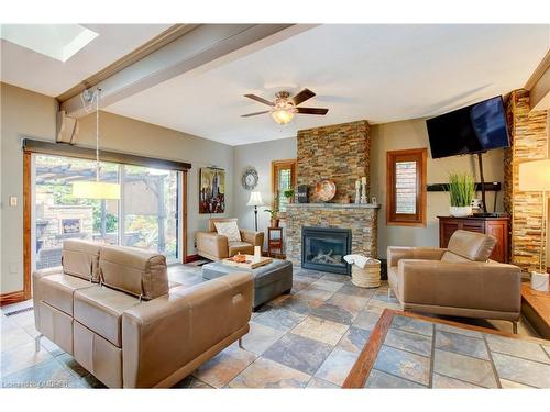 8494 20 Road E, Hamilton, ON - Indoor Photo Showing Living Room With Fireplace