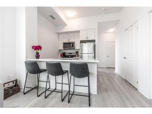 519-460 Dundas Street E, Waterdown, ON - Indoor Photo Showing Kitchen