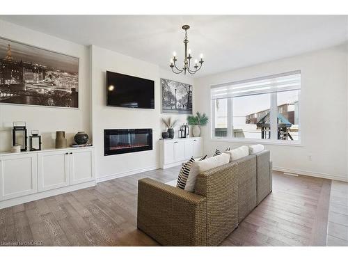 1429 Sycamore Garden, Milton, ON - Indoor Photo Showing Living Room With Fireplace