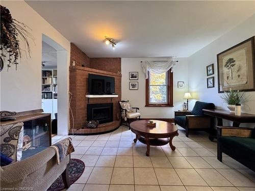 1650 6Th Con Rd W Road, Branchton, ON - Indoor Photo Showing Living Room With Fireplace