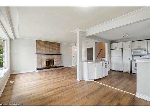 66 Victor Boulevard, Hamilton, ON - Indoor Photo Showing Kitchen With Fireplace