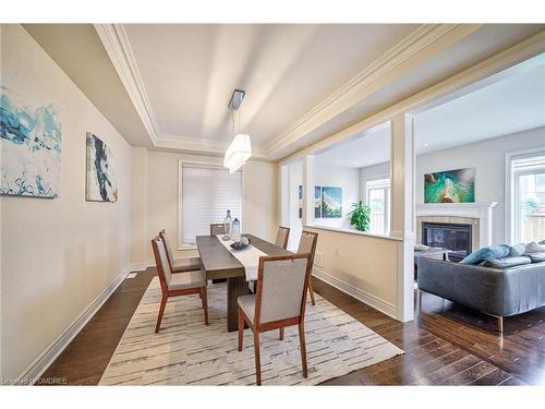 211 Sixteen Mile Drive, Oakville, ON - Indoor Photo Showing Dining Room With Fireplace