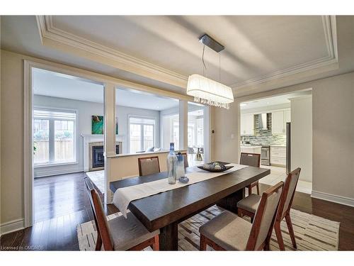 211 Sixteen Mile Drive, Oakville, ON - Indoor Photo Showing Dining Room With Fireplace