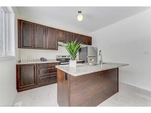 15 Simona Avenue, Wasaga Beach, ON - Indoor Photo Showing Kitchen With Double Sink