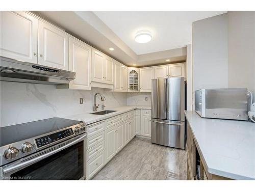 1202-81 Millside Drive, Milton, ON - Indoor Photo Showing Kitchen With Stainless Steel Kitchen