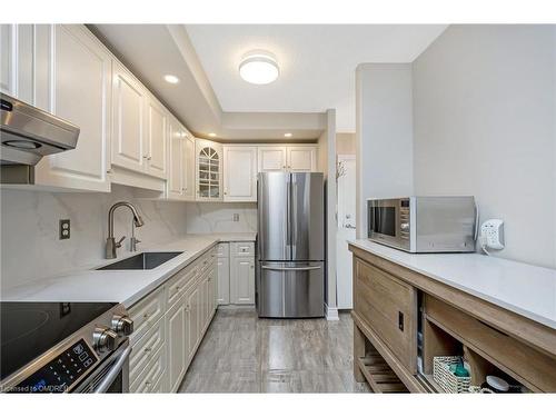 1202-81 Millside Drive, Milton, ON - Indoor Photo Showing Kitchen With Stainless Steel Kitchen