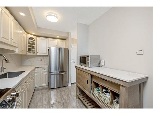 1202-81 Millside Drive, Milton, ON - Indoor Photo Showing Kitchen With Stainless Steel Kitchen