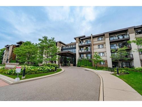 417-128 Garden Drive, Oakville, ON - Outdoor With Balcony With Facade