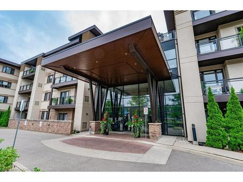 417-128 Garden Drive, Oakville, ON - Outdoor With Balcony With Facade