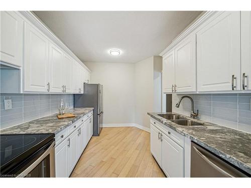 708-5250 Lakeshore Road, Burlington, ON - Indoor Photo Showing Kitchen With Stainless Steel Kitchen With Double Sink With Upgraded Kitchen