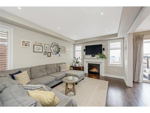 1166 Biason Circle, Milton, ON - Indoor Photo Showing Living Room With Fireplace