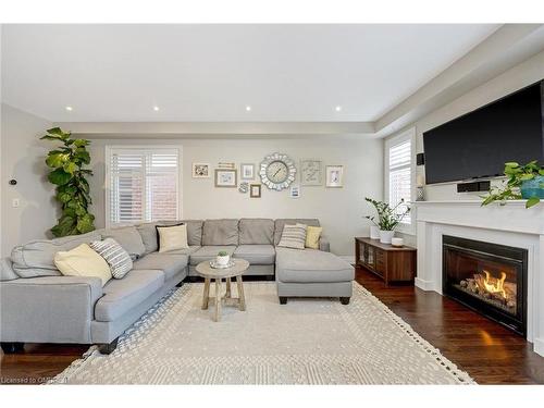 1166 Biason Circle, Milton, ON - Indoor Photo Showing Living Room With Fireplace